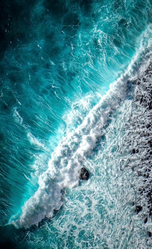 Waves hitting rock